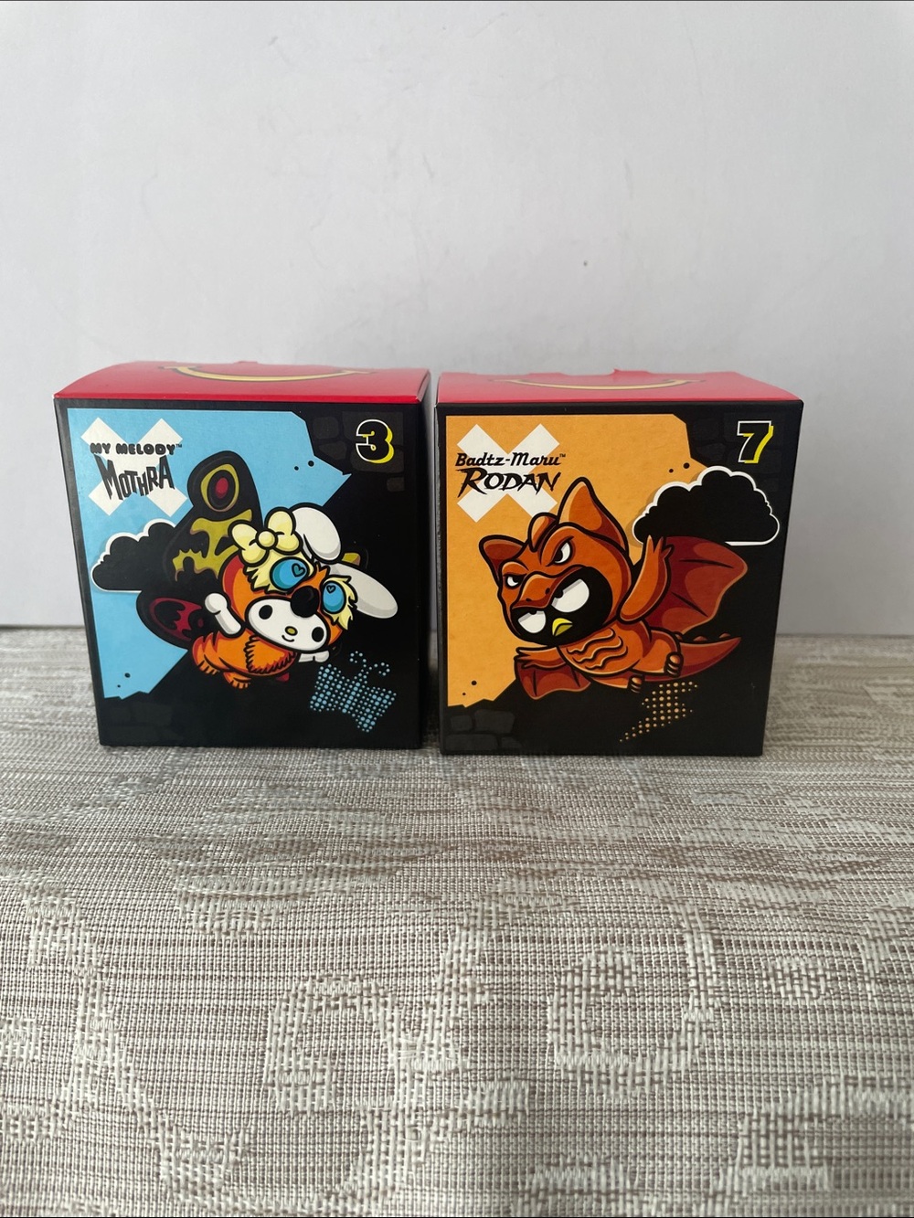 McDonald's Badtz-Maru Rodan & My Melody Mothra Collectible Boxes - Orange & Blue